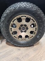 Tacoma Trailhunter Rims and Black Lug nuts.jpg