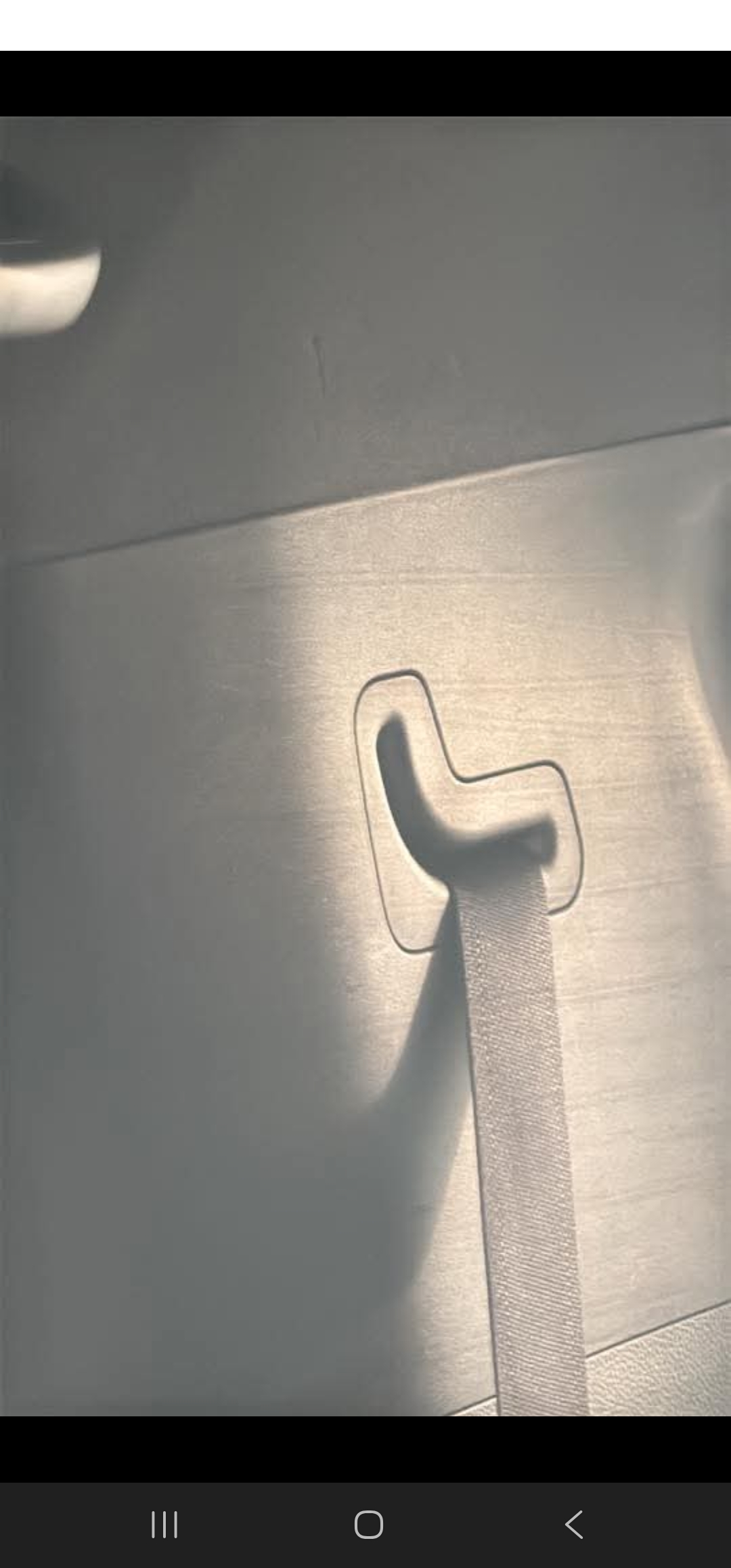 Third Row Seatbelt trim piece.jpg
